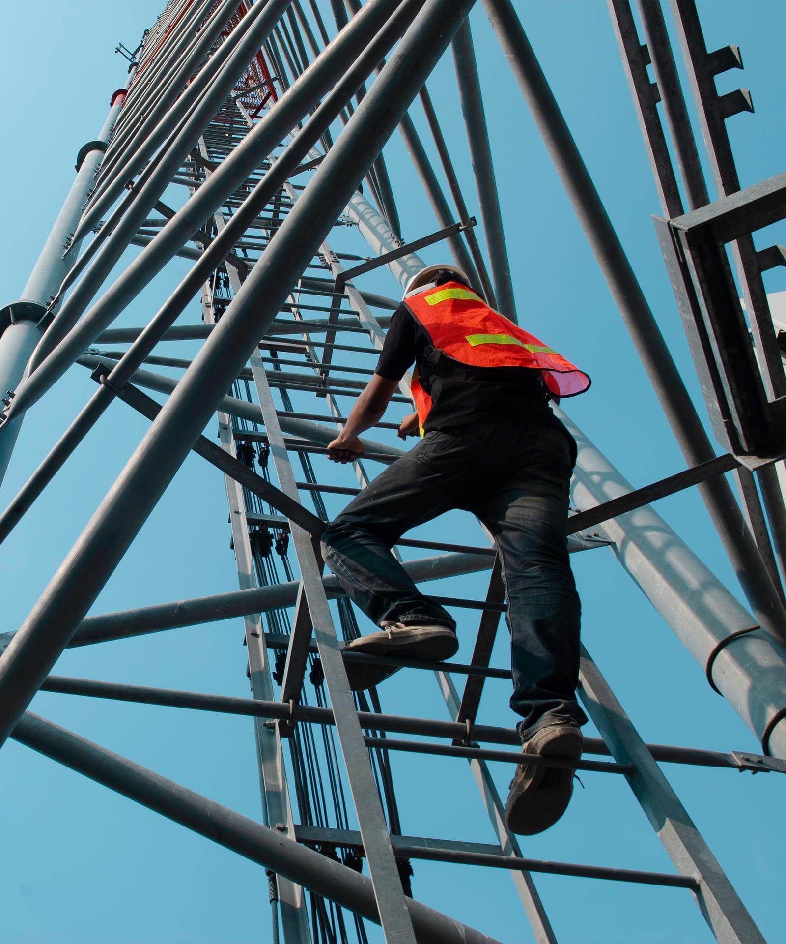 Person climbing an antenna